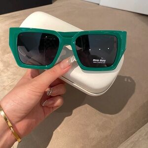Miu Miu Bold Green Cat Eye Sunglasses